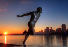 Statue of man running